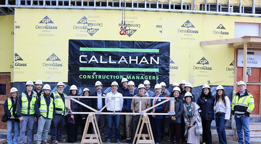 Callahan Construction Managers tops off 52 New St. - 106 affordable apts. and 3,875 s/f mixed-use for Just A Start 